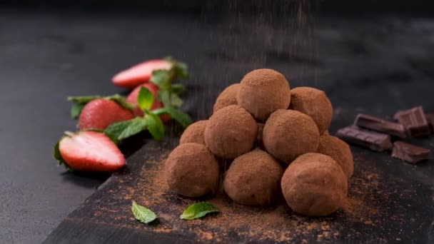 Slow Motion Sieving Cocoa Powder Chocolate Truffles Black Background Luxury — Stock Video