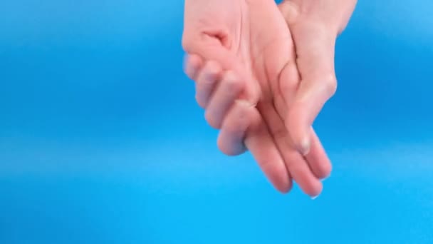 Woman Applying Hand Cream Vegan Avocado Hand Cream Blue Background — Stock Video