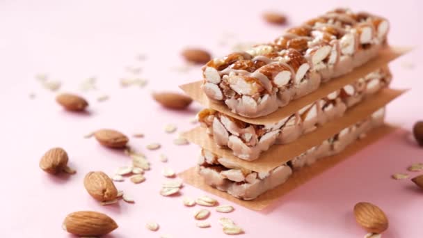 Protein Granola Bars Almonds Pink Background Closeup View — Stock Video