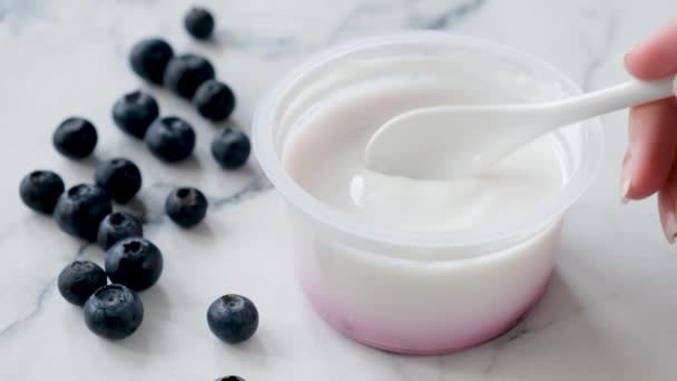 Eating Greek Yogurt Person Takes Spoonful Greek Yogurt Two Layer — Stock Video
