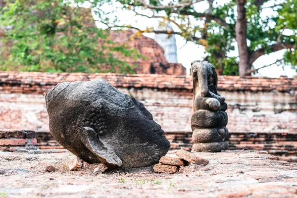 The head of the Buddha was broken from the head. Phra Nakhon Si Ayutthaya Province, Thailand.