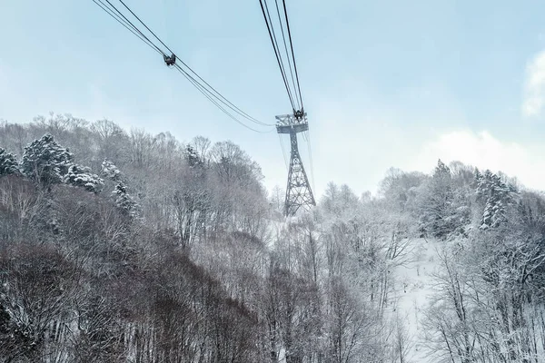 Ropeway Going Top Mountain Cable Weather Conditions Snow Cover Shin — Stock Photo, Image
