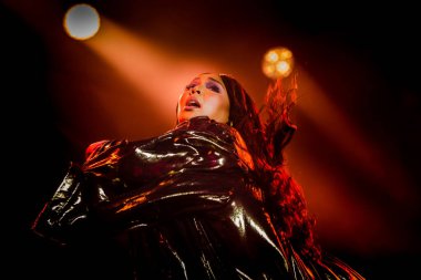 AMSTERDAM, NETHERLANDS - NOVEMBER 18, 2019: Amazing Lizzo performing at show at AFAS Live concert hall. clipart