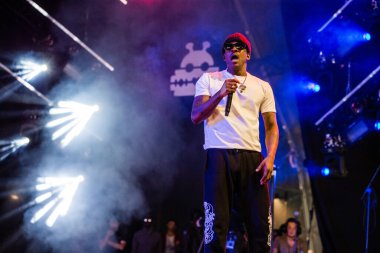 Skepta performing on stage during music festival