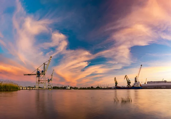 industrial areas, shipyard and port at sunset, Szczecin, Poland