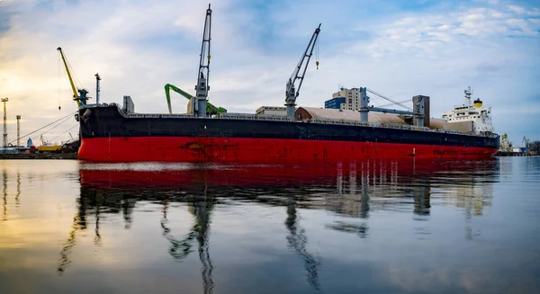 merchant ship in the sea port