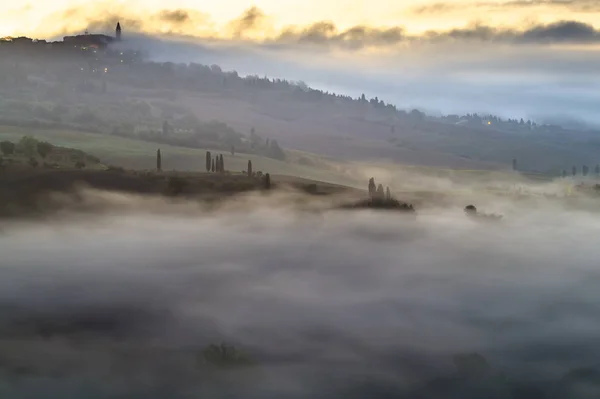 Pienza, Italy-September 2015: the famous Tuscan landscape at sunri — стоковое фото