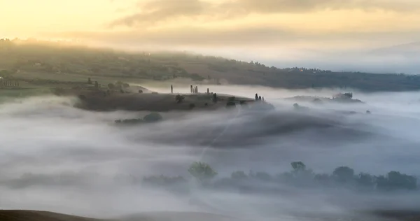 Pienza, Italy-September 2015: the famous Tuscan landscape at sunri — стоковое фото