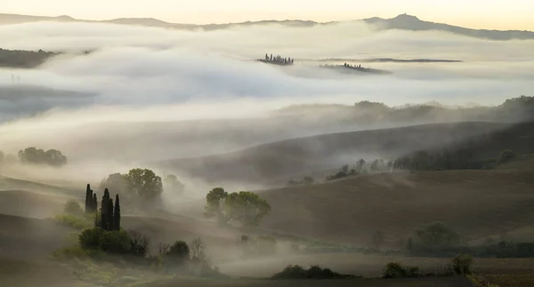 Pienza, Italy-September 2015: the famous Tuscan landscape at sunri — стоковое фото