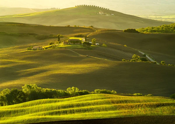 Pienza, Italy-September 2015: the famous Tuscan landscape at sunri — стоковое фото