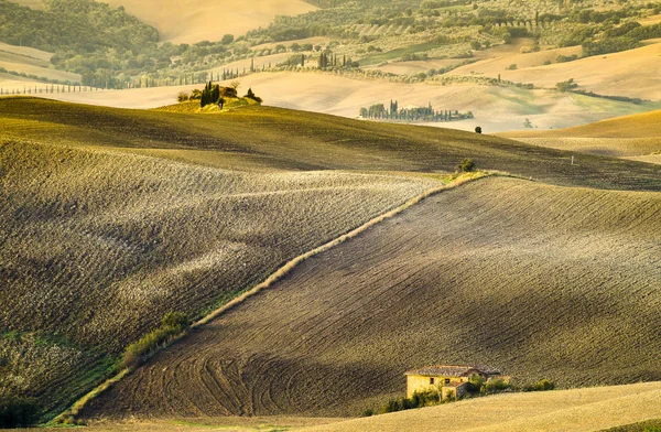 Pienza, Itália-setembro de 2015: a famosa paisagem toscana ao nascer do sol — Fotografia de Stock