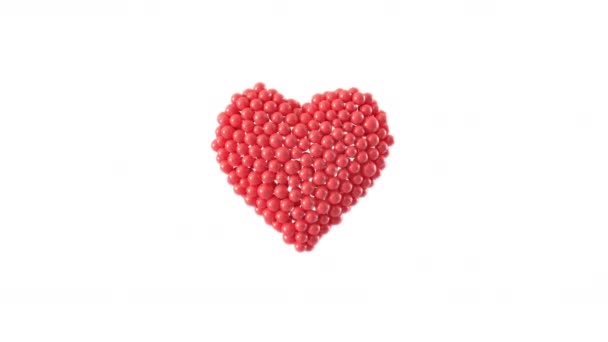 Forme de coeur faite de sphères brillantes animation. Saint-Valentin. rendu 3D .