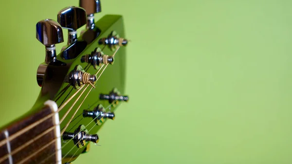 Guitar Headstock Closeup Green Background Copy Space — Stock Photo, Image