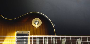 Klasik gitar kapanışı. Renkli arka plan. Boşluğu kopyala