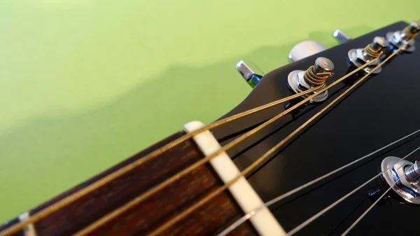 Guitar Headstock Closeup Green Background — Stock Photo, Image