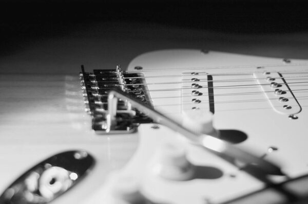 Electric guitar closeup . dark background