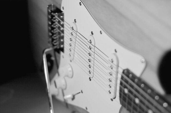Electric guitar closeup . Black and white