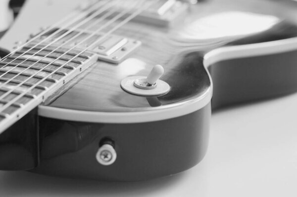 Electric guitar closeup . Black and white