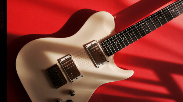 Electric guitar closeup . Color background with copy space