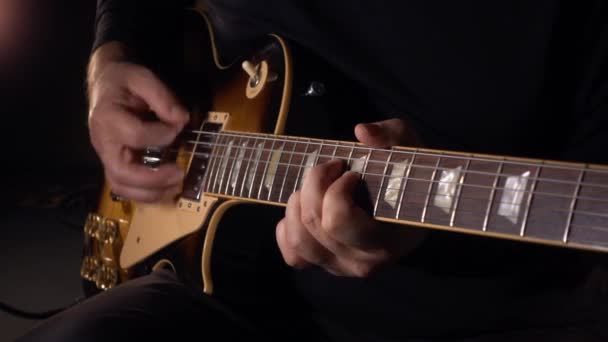 Guitarist Plays Electric Guitar Slow Motion 50P — Stock Video