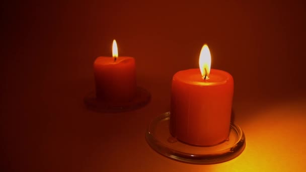 Burning Red Candle Red Background Slow Motion 50P — Stock Video