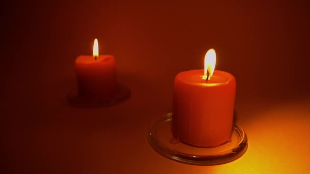 Burning Red Candle Red Background Slow Motion 100P — Stock Video