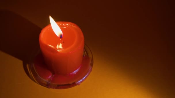 Burning Red Candle Red Background Slow Motion 100P — Stock Video