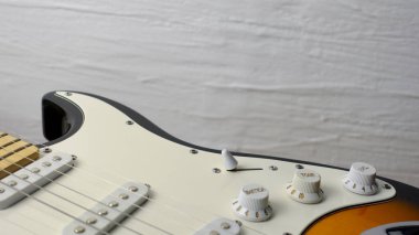 Elektro gitar kapanışı. Kopyalama alanı olan beyaz arkaplan 