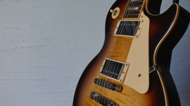 Elektro gitar kapanışı. Kopyalama alanı olan beyaz arkaplan 