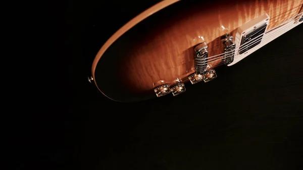 ヴィンテージのエレキギターのクローズアップ 暗い背景にコピースペースがあり — ストック写真