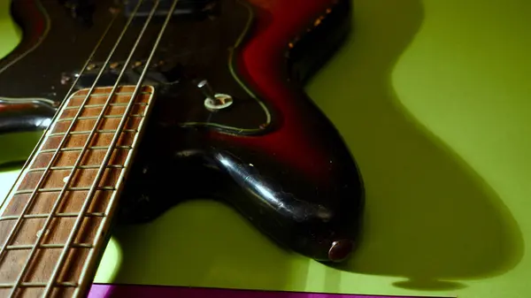 Old Bass Guitar Closeup Color Background Copy Space — Stock Photo, Image