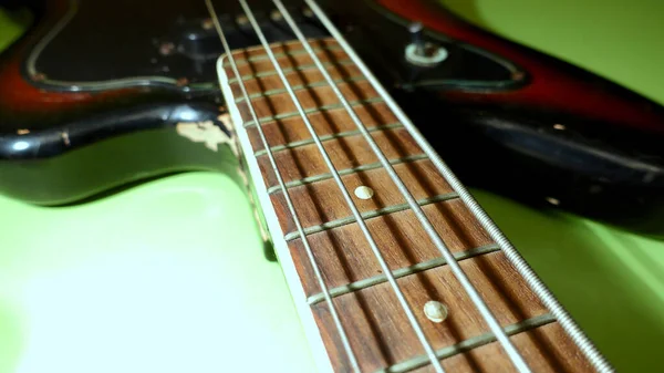 Old Bass Guitar Closeup Color Background Copy Space — Stock Photo, Image