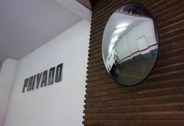 mirror at the exit of a garage to see if cars are coming