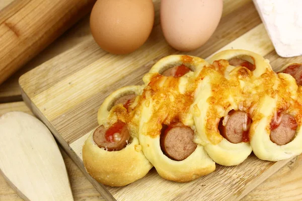 Delicious Bakery Wooden Table Bread Sausages — Stock Photo, Image