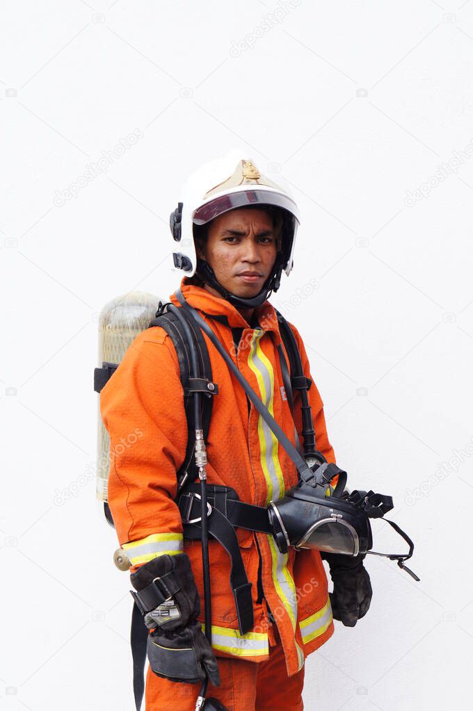 fireman officer with full fire fighting equipment