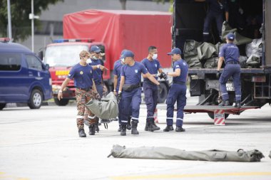 KLIA, Malezya - 22 Mart 2020 Yolcu uçuşlarını görüntüleme operasyonu. Ulusal Afet Yönetim Ajansı NADMA altında Malezya itfaiye ve kurtarma departmanı tarafından yürütülen operasyonlar