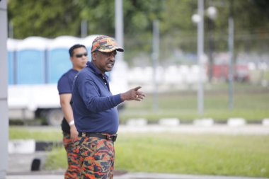 KLIA, Malezya - 22 Mart 2020 Yolcu uçuşlarını görüntüleme operasyonu. Ulusal Afet Yönetim Ajansı NADMA altında Malezya itfaiye ve kurtarma departmanı tarafından yürütülen operasyonlar