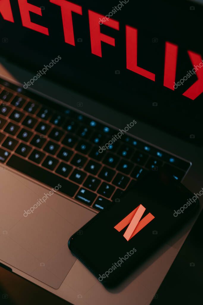 IPhone with Netflix logo screen.