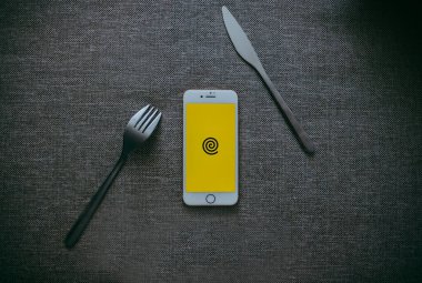 Yandex food app logo on the iphone screen. clipart