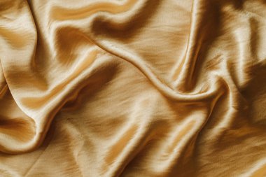 Altın saten kumaş.