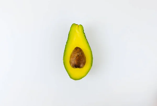 Ripe avocado sliced isolated on a white background. — Stock Photo, Image