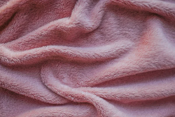 Tekstura tła różowy miękki dotyk tkaniny z fałdami. — Zdjęcie stockowe