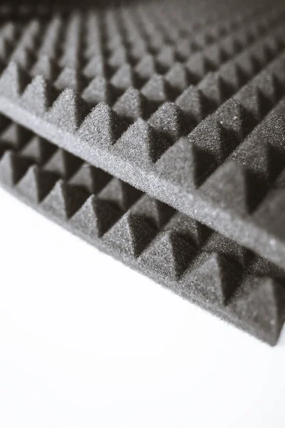 Sheets of black acoustic foam rubber.