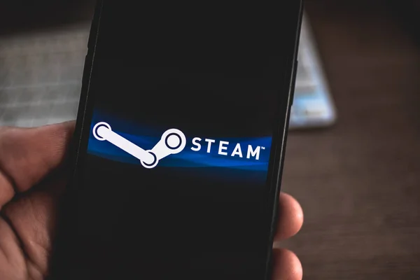 Λογότυπο εφαρμογής Steam στην οθόνη smartphone. — Φωτογραφία Αρχείου