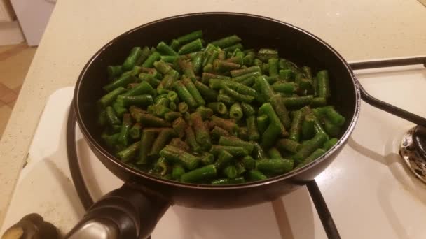 Beans fried in a pan — Stock Video