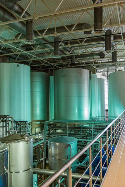 Equipment for production of beer in factory shops — Stock Photo, Image