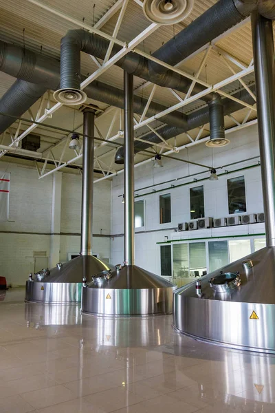 Equipment for production of beer in factory shops — Stock Photo, Image