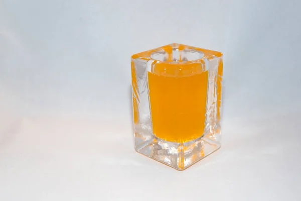 Pot en verre avec liquide brillant — Photo