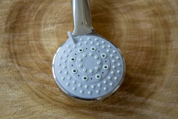 Shower Head Made Metallic Color Plastic Natural Wood Background — Stock Photo, Image