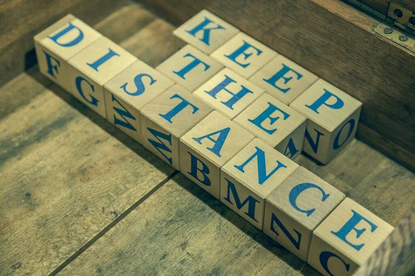 Wooden Cubes Lettering Keep Distance Blue Letters — Stock Photo, Image